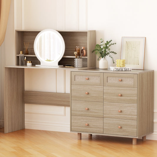 Modern light wood vanity desk with round mirror, makeup items, green plant, books, and artwork in elegant room